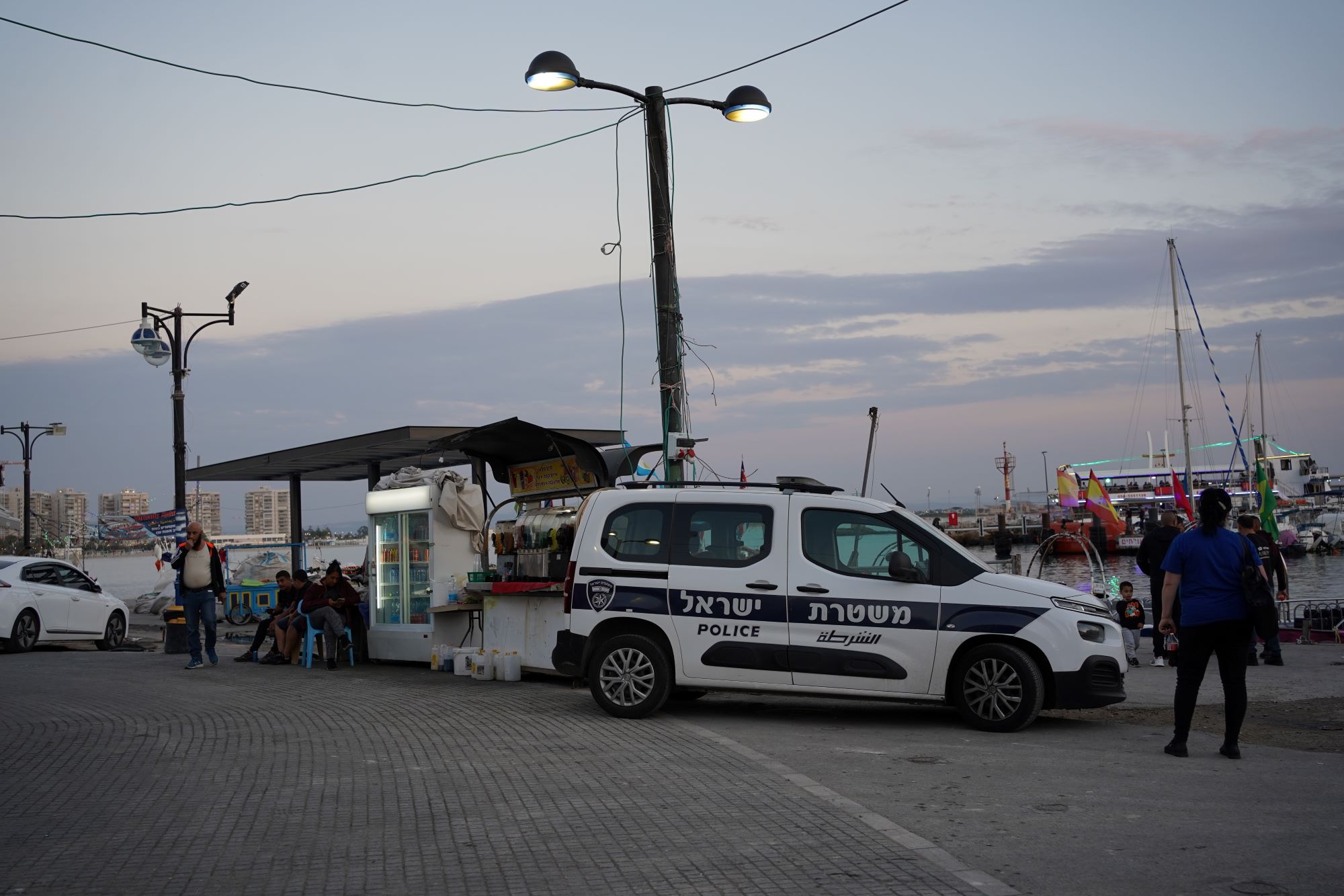 A police car at the port in the Old City of Akka, November 2022. (Maria Zreik)