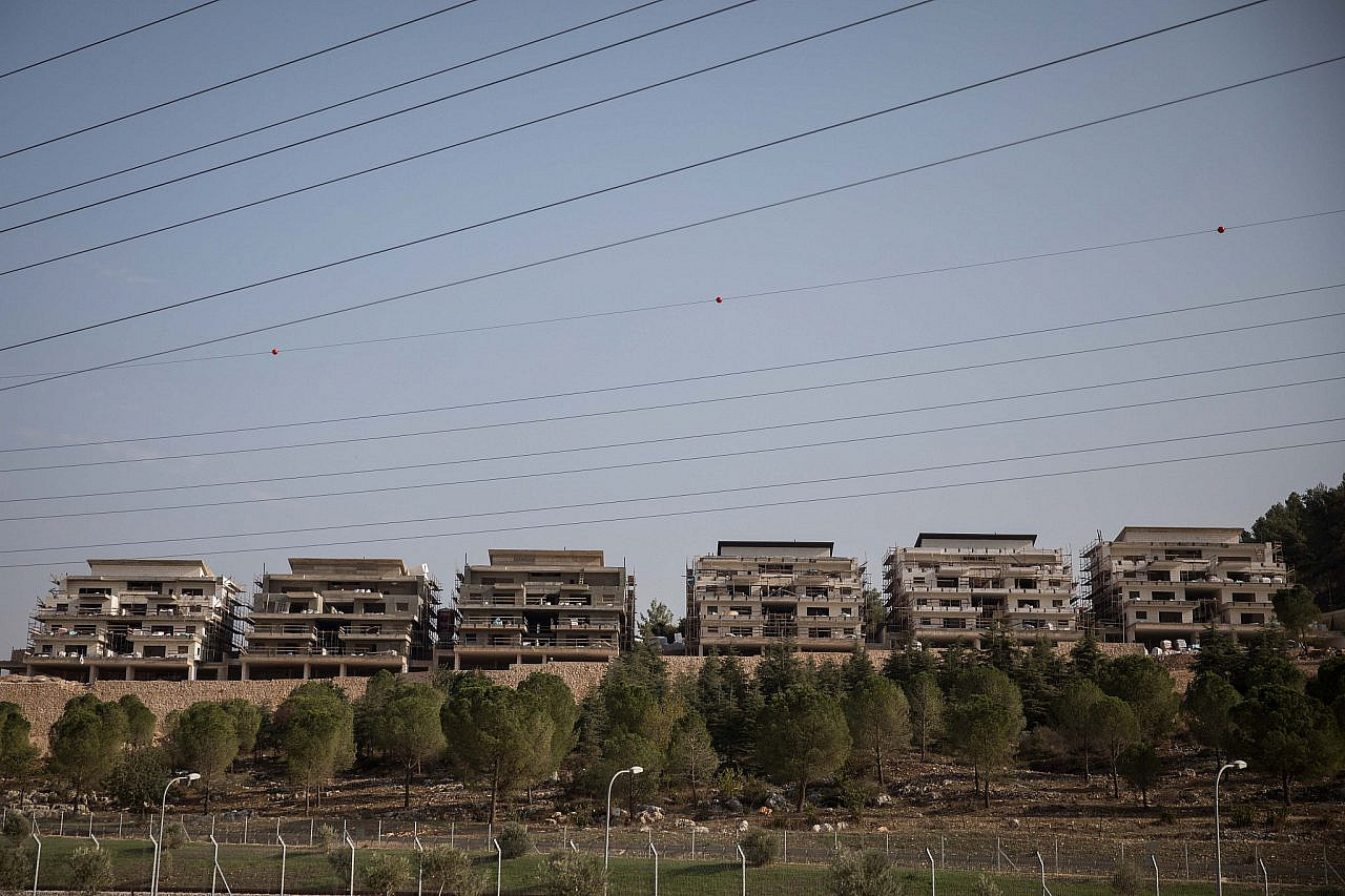 View of construction of new apartment buildings in the northern Israeli city of Karmiel, seen from the Palestinian town of Majd al-Krum, November 8, 2017. (Hadas Parush/Flash90)