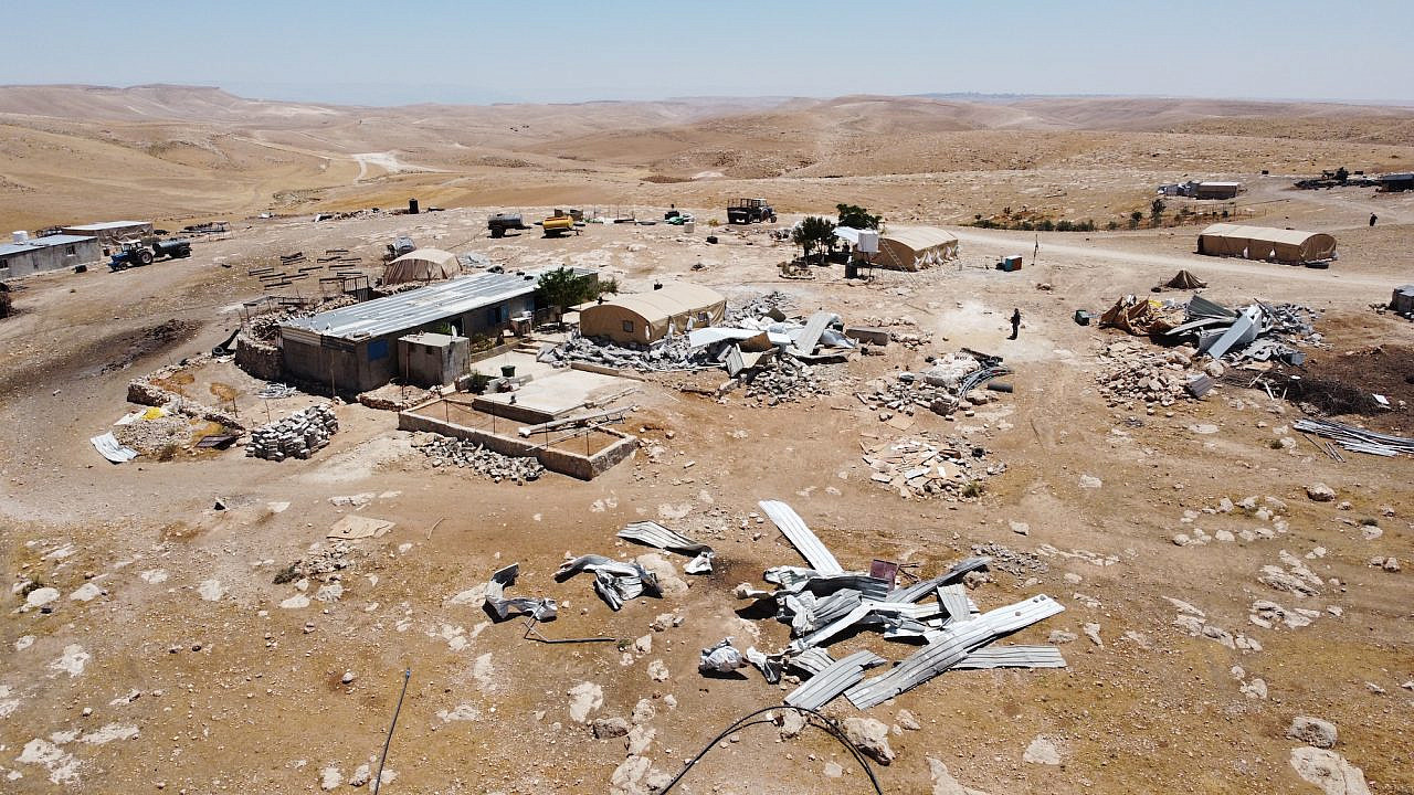 An aerial view of the Palestinian hamlet of Al-Fakheit in Masafer Yatta, May 18, 2022. The compound, belonging to the Abu Sabhah family, was demolished by Israeli forces on May 11, 2022. (Keren Manor/Activestills.org)