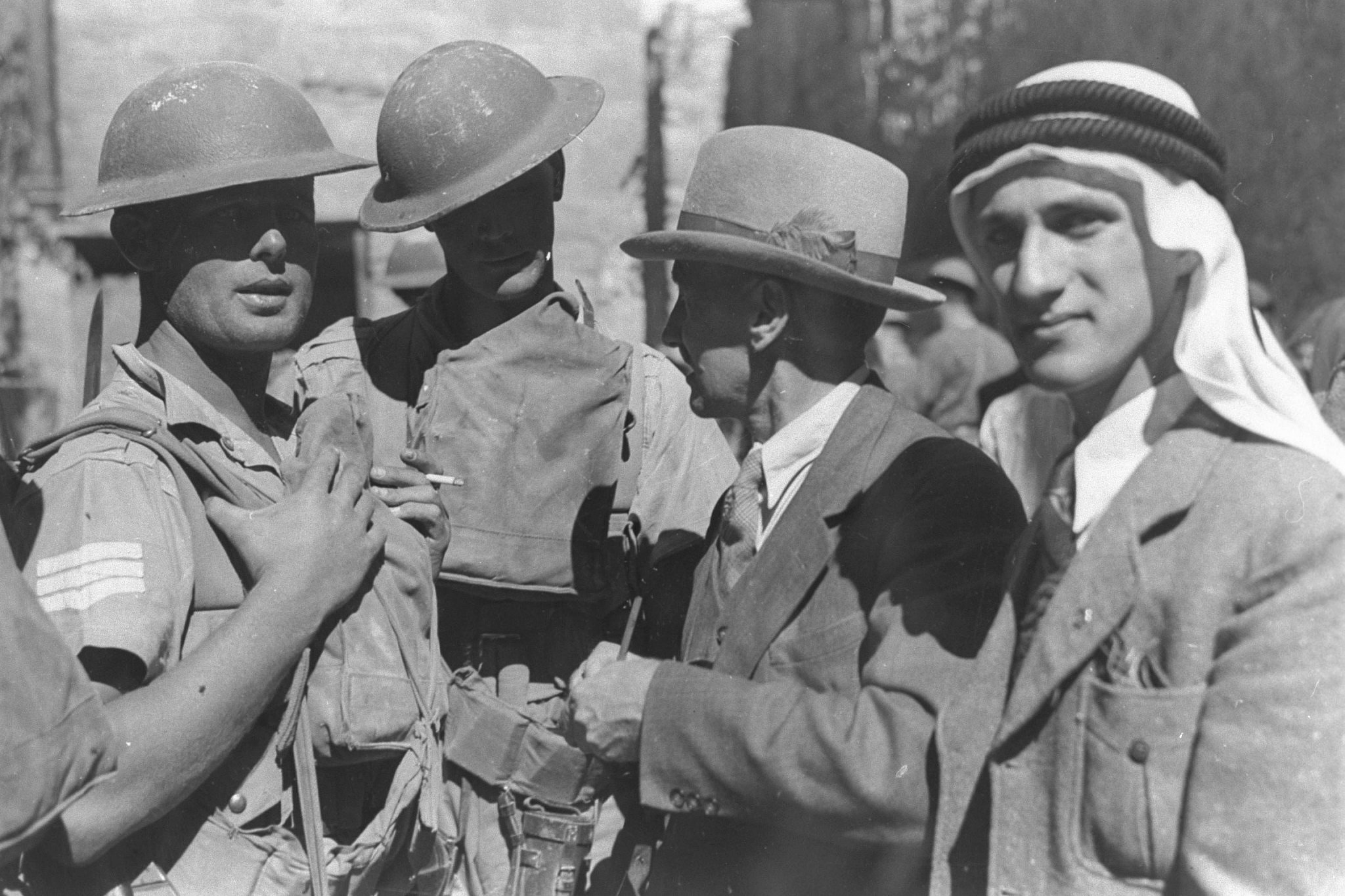 British soldiers in the Old City of Jerusalem encounter local residents, October 30, 1938. (American Colony/GPO)