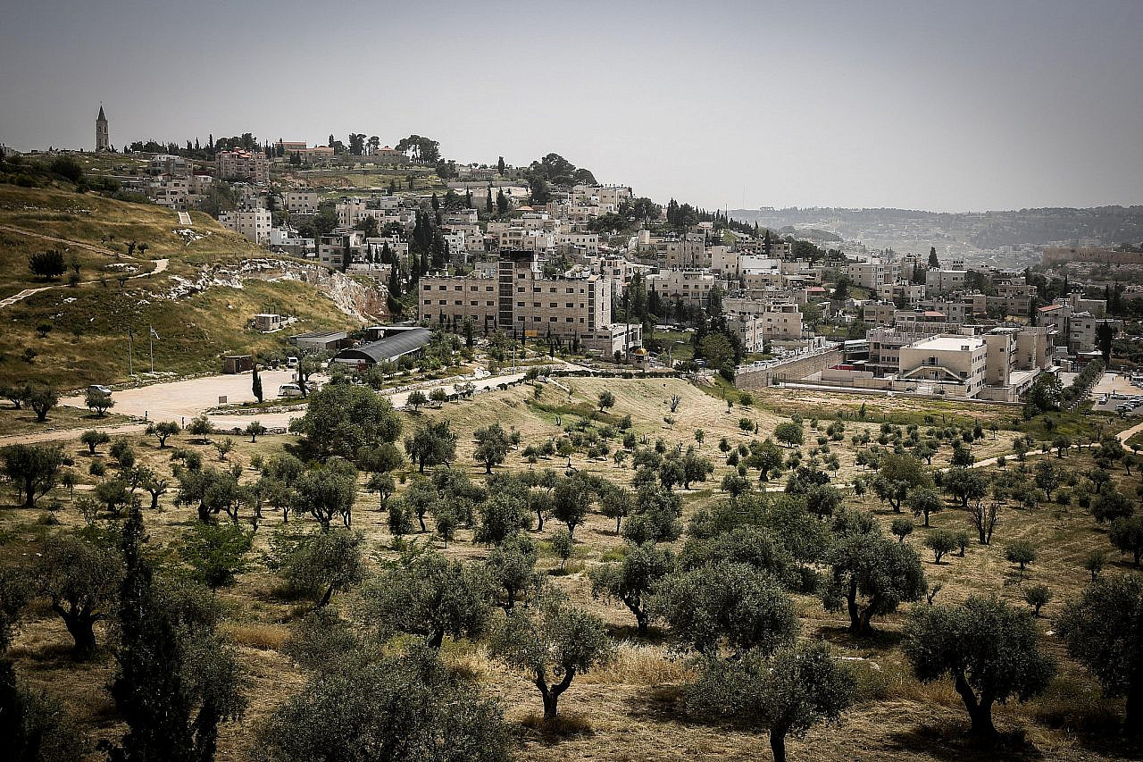 View of the Palestinian neighborhoods of A-Tur (above) and Wadi Joz (below) in occupied East Jerusalem, near the Mount of Olives, April 27, 2015. (Hadas Parush/Flash90)