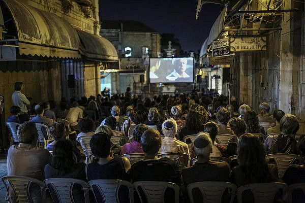 A film is screened at Muristan Square in Jerusalem's Old City as part of the Jerusalem Film Festival, July 14, 2015. (Hadas Parush/Flash90)