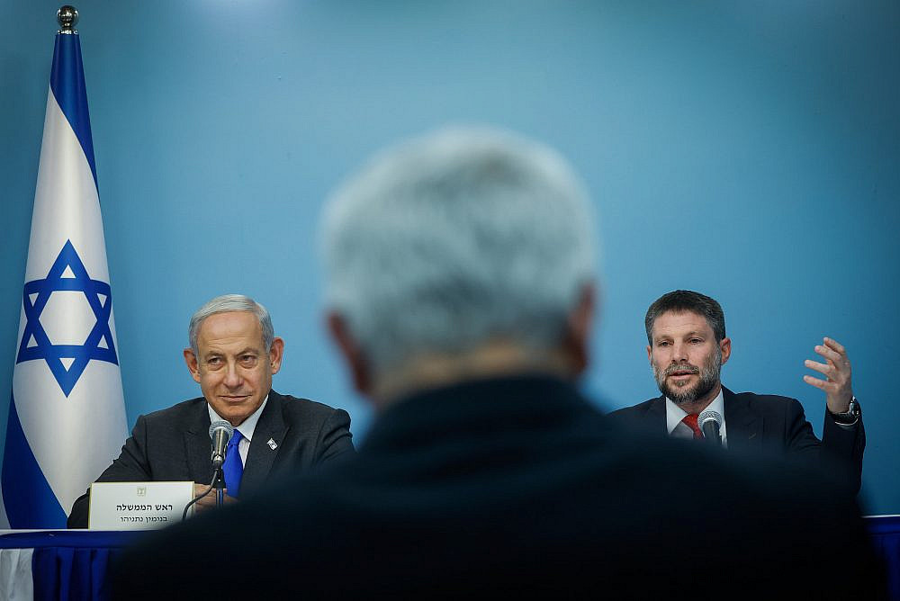 Israeli Prime Minister Benjamin Netanyahu gives a press conference with Finance Minister Bezalel Smotrich at the Prime Minister's Office in Jerusalem, January 11, 2023. (Olivier Fitoussi/Flash90)