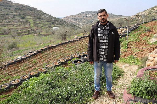 Mustafa Hammad, Farkha's mayor, on the farm by his house, January 10, 2023. (Ahmad Al-Bazz)