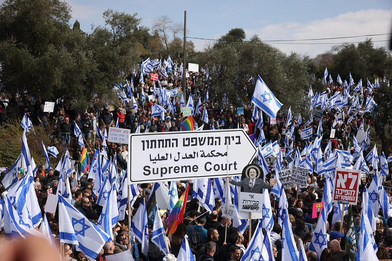 Thousands of Israelis, who are participating in a general strike, demonstrate in front of the Knesset against the government's proposed judicial reform, Jerusalem, February 13, 2023. (Oren Ziv)
