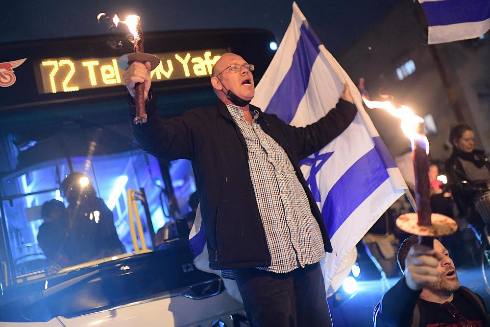 Israelis protest against Israel's far-right government, Tel Aviv, January 7, 2023. (Tomer Neuberg/Flash90)