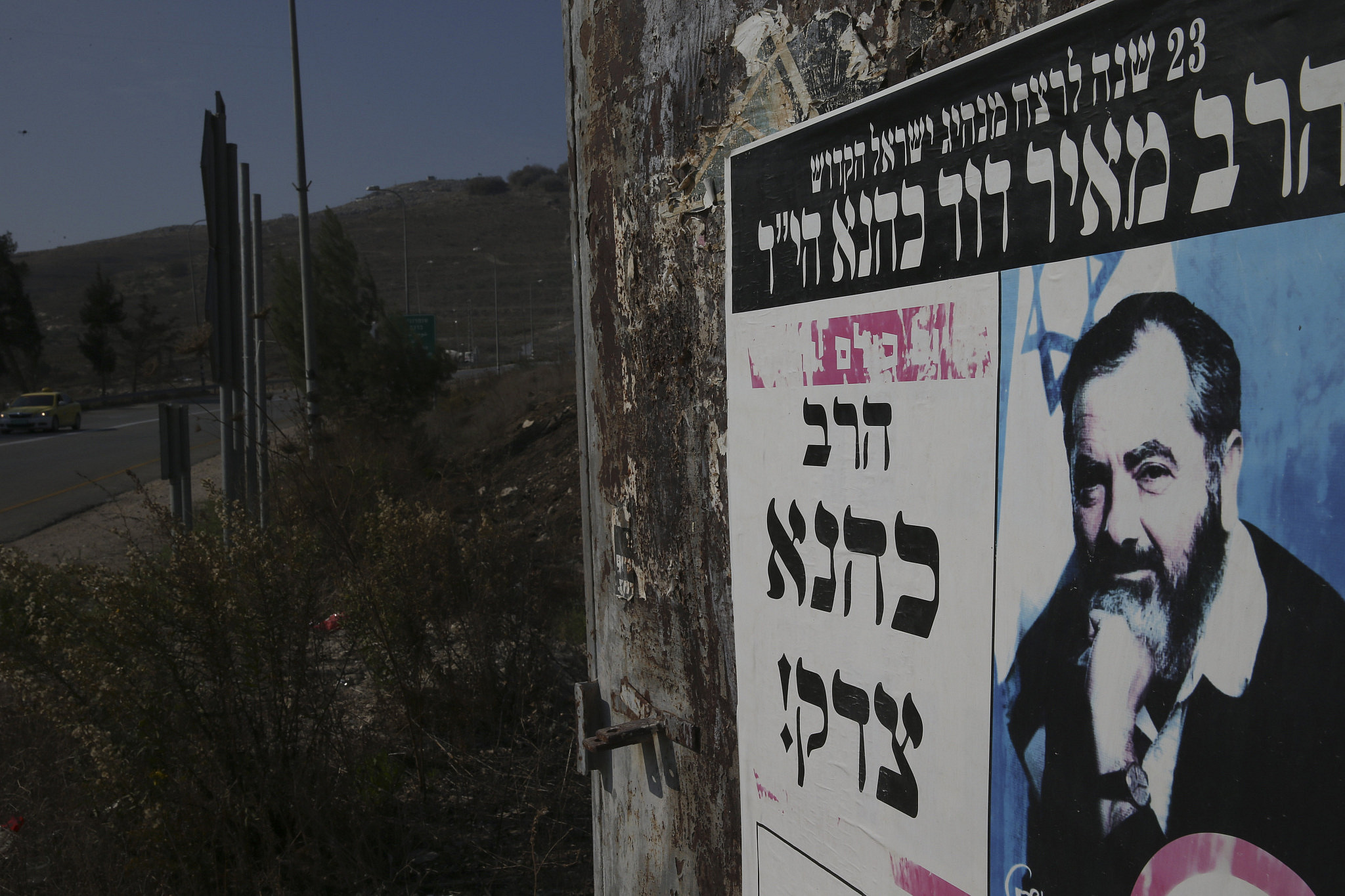 A poster reads "Kahane was right" on the side of a road in the West Bank. November 19, 2013. (Nati Shohat/Flash90)