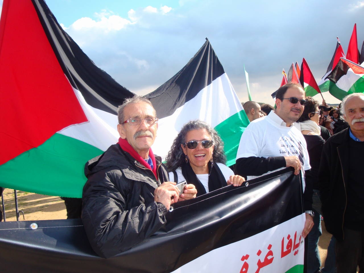 Smadar Lavie (center) with Reuven Abergel (left), one of the founders of the Israeli Black Panthers, at a march for Gaza, 2009. (Courtesy) 