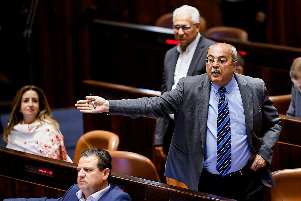 MK Ahmad Tibi reacts during a discussion and a vote on The vote on the "Flag Bill" in the Knesset, Jerusalem,  June 1, 2022. (Olivier Fitoussi/Flash90)