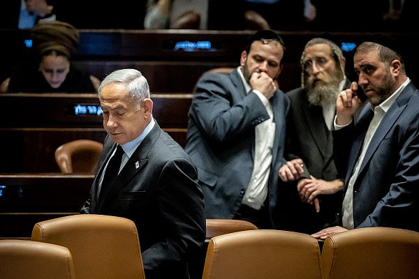 Prime Minister Benjamin Netanyahu seen during a vote in Knesset, Jerusalem, March 22, 2023. (Yonatan Sindel/Flash90)