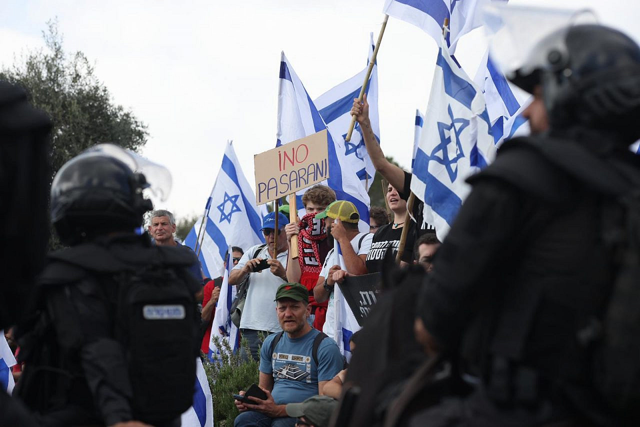 Israeli protesters gather outside the Knesset, calling for the Netanyahu government to halt its judicial overhaul plans, March 27, 2023. (Oren Ziv)