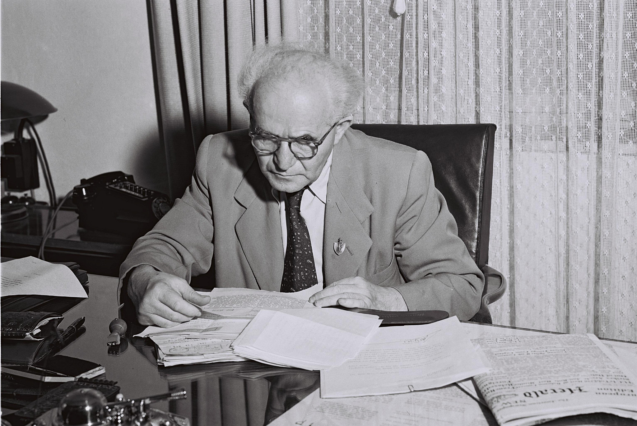 Israeli Prime Minister David Ben-Gurion reading a state correspondence, Sep. 20, 1949. (David Eldan/GPO)