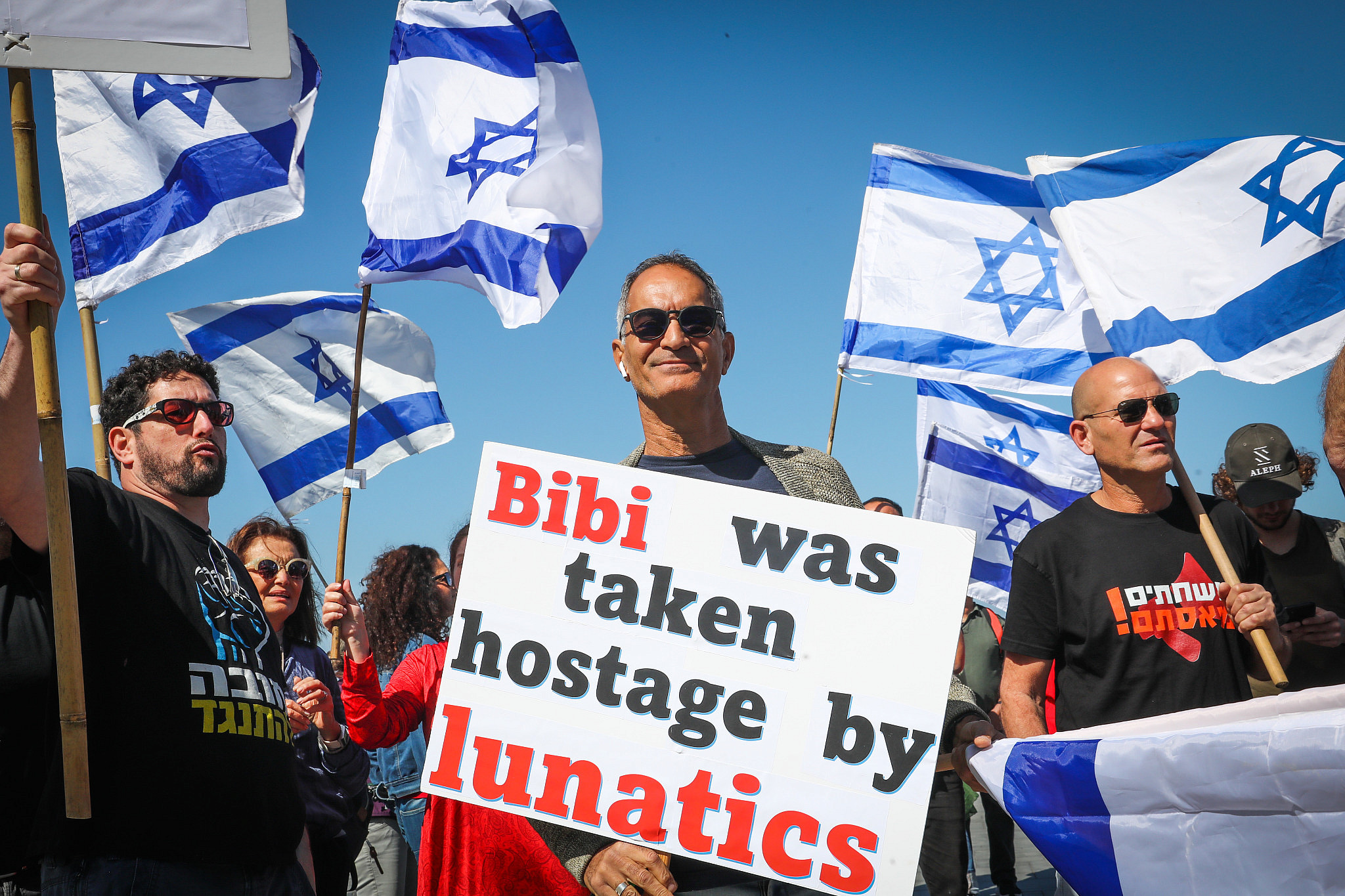Israelis protest against the government's planned judicial overhaul, outside the U.S. consulate in Tel Aviv, March 16, 2023. (Gideon Markowicz/Flash90)