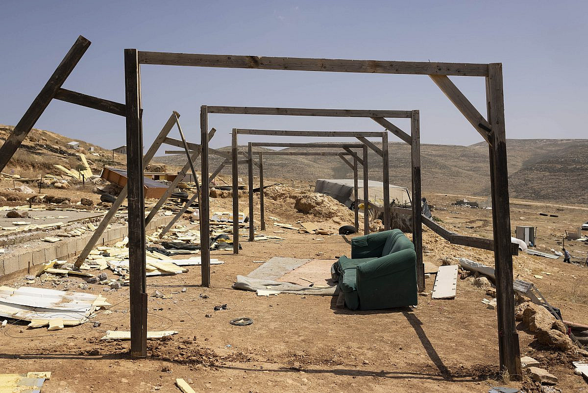 The belongings and remains of homes of Palestinian families in 'Ein Samia, occupied West Bank, May 25, 2023. (Oren Ziv)
