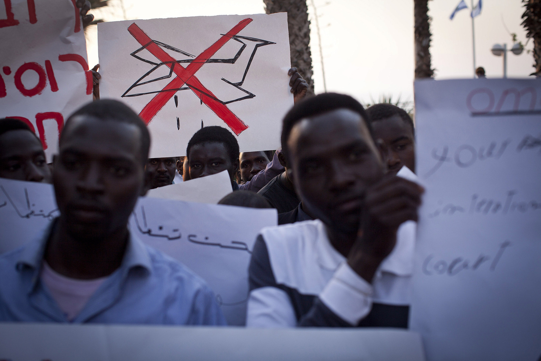 Sudanese refugees living in Israel protest in front of the Russian embassy in Tel Aviv, April 5, 2012. (Oren Ziv/Activestills)