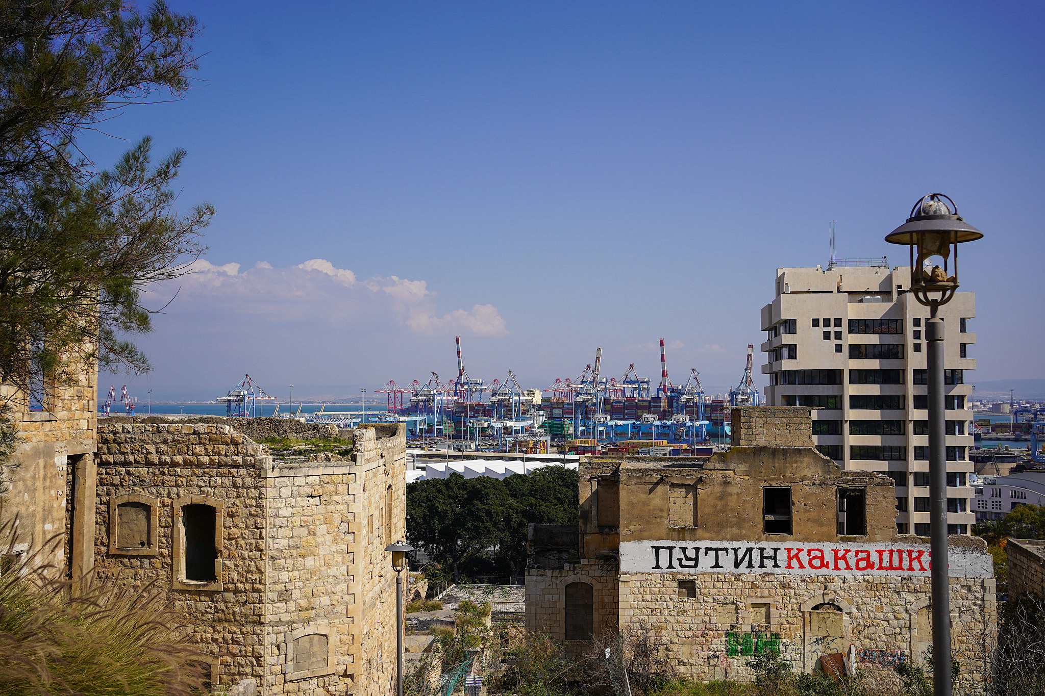 View of the Haifa port from Wadi al-Saleeb, Haifa, February 14, 2023. (Maria Zreiq)