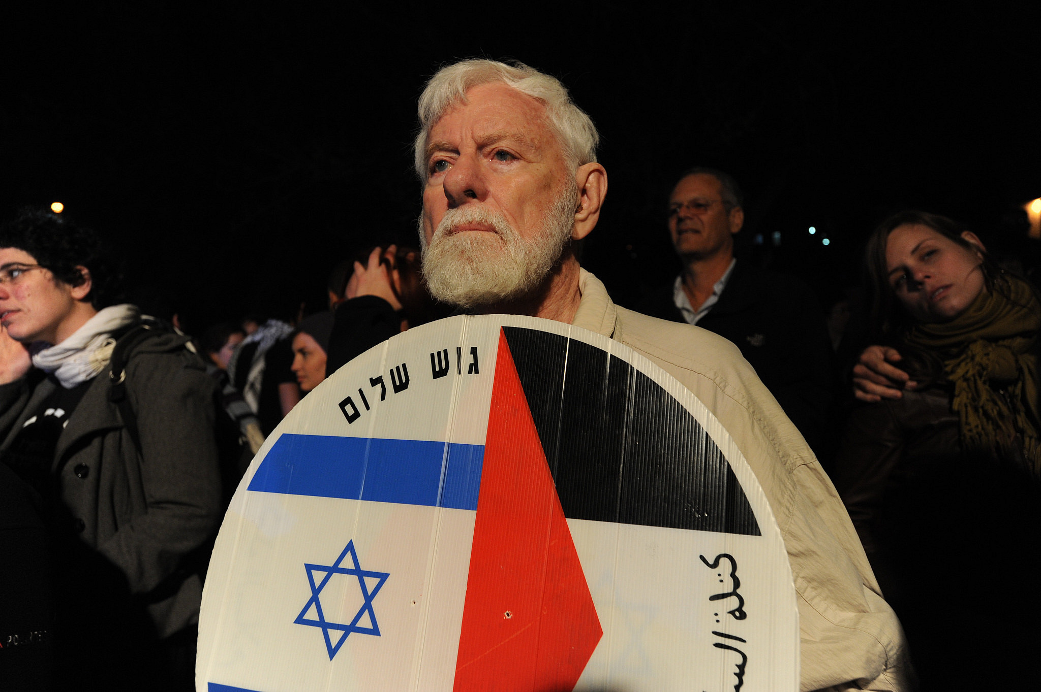 Uri Avnery stands alongside Palestinian and left-wing activists during a protest against Israeli settlement activity in the Sheikh Jarrah neighbourhood of East Jerusalem, March 06, 2010. (Gili Yaari/Flash 90)