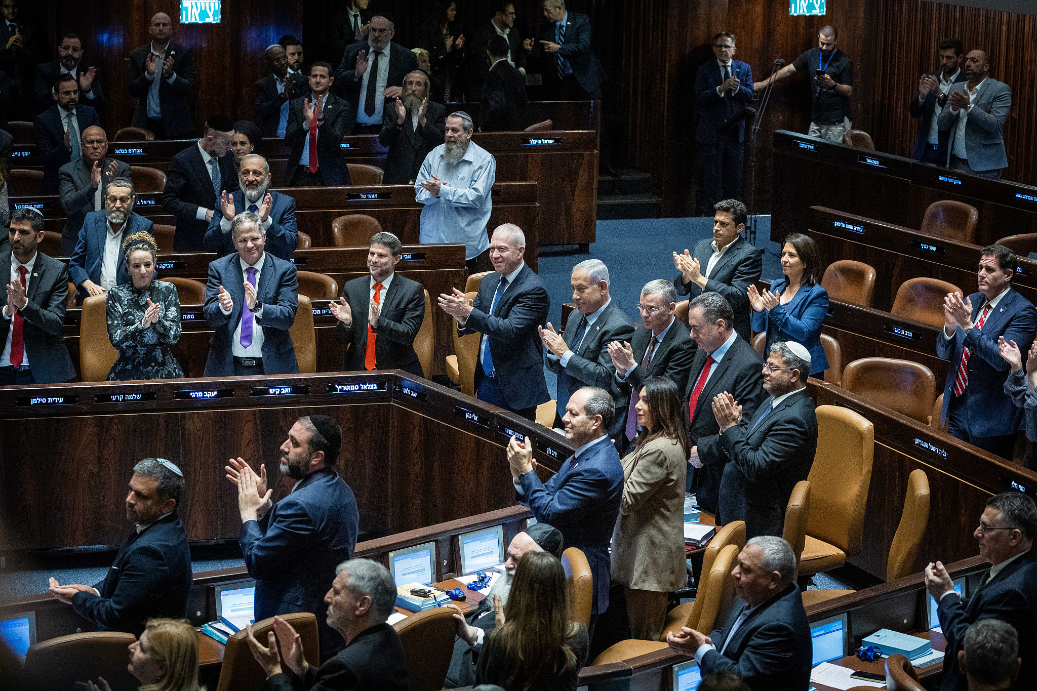 Israeli politicians clap their hands after a speech of U.S. House Speaker Kevin McCarthy during the opening of the summer session in the assembly hall of the Knesset in Jerusalem, May 1, 2023. (Yonatan Sindel/Flash90)
