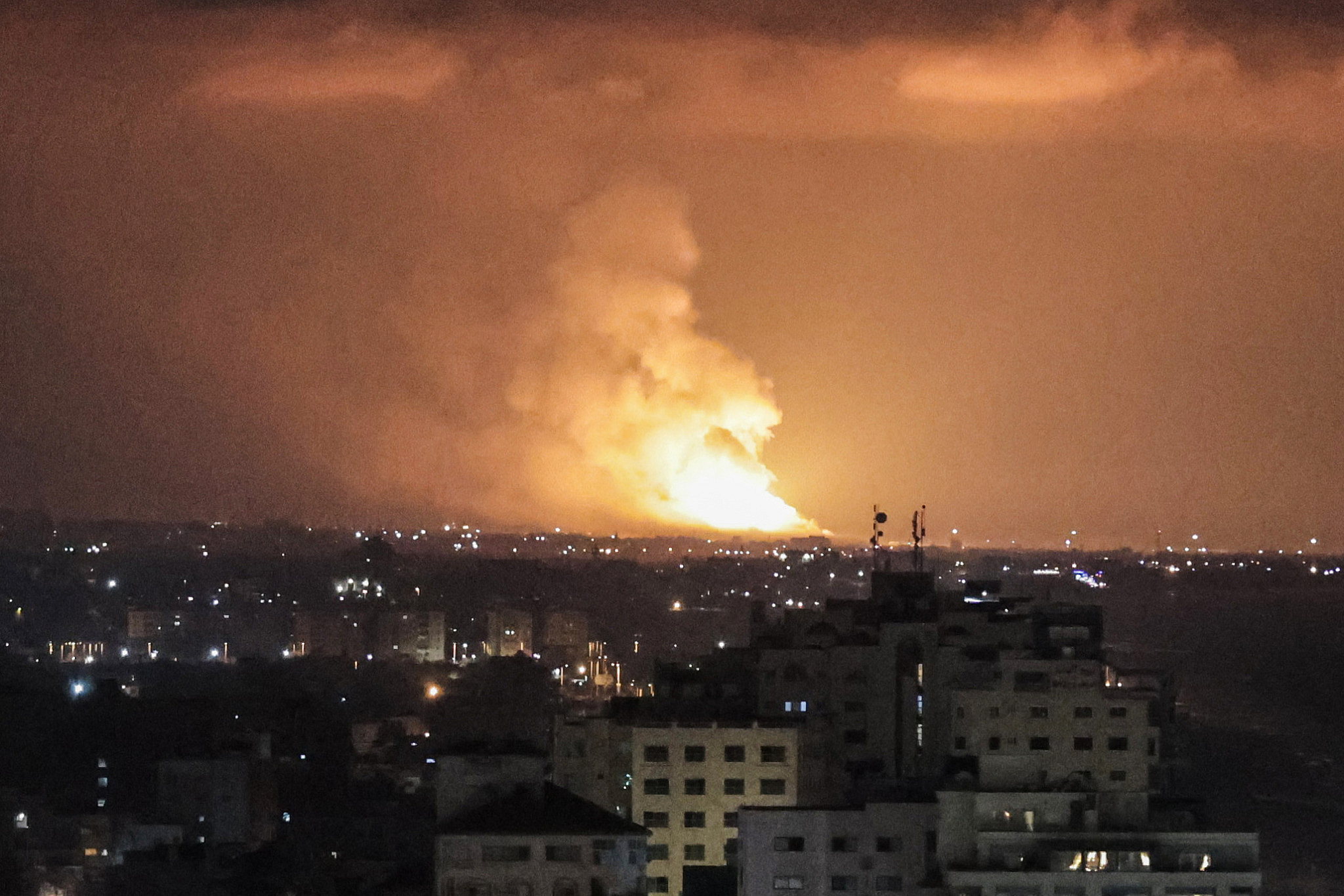 Flame and smoke are seen during an Israeli air strike on Islamic Jihad targets, in Gaza, May 9, 2023. (Atia Mohammed/Flash90)