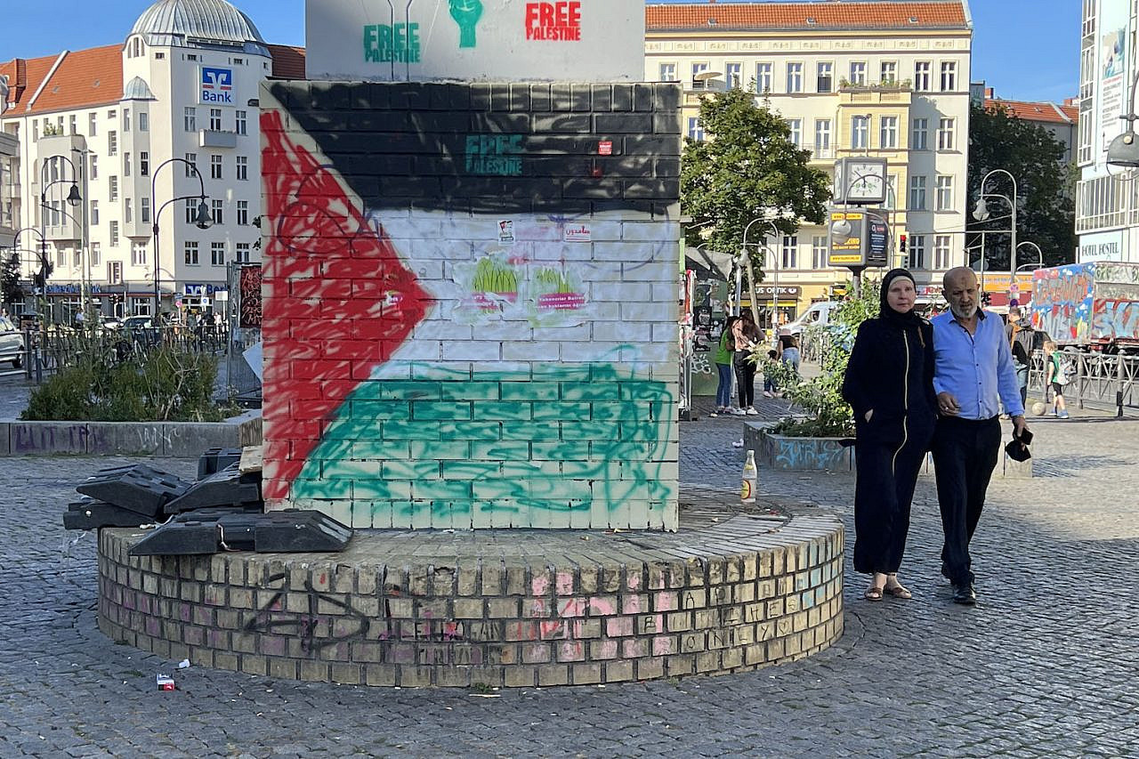 A graffiti of a Palestinian flag is seen in Hermannplatz in Berlin's Neukölln neighborhood, July 21, 2022. (Oren Ziv)