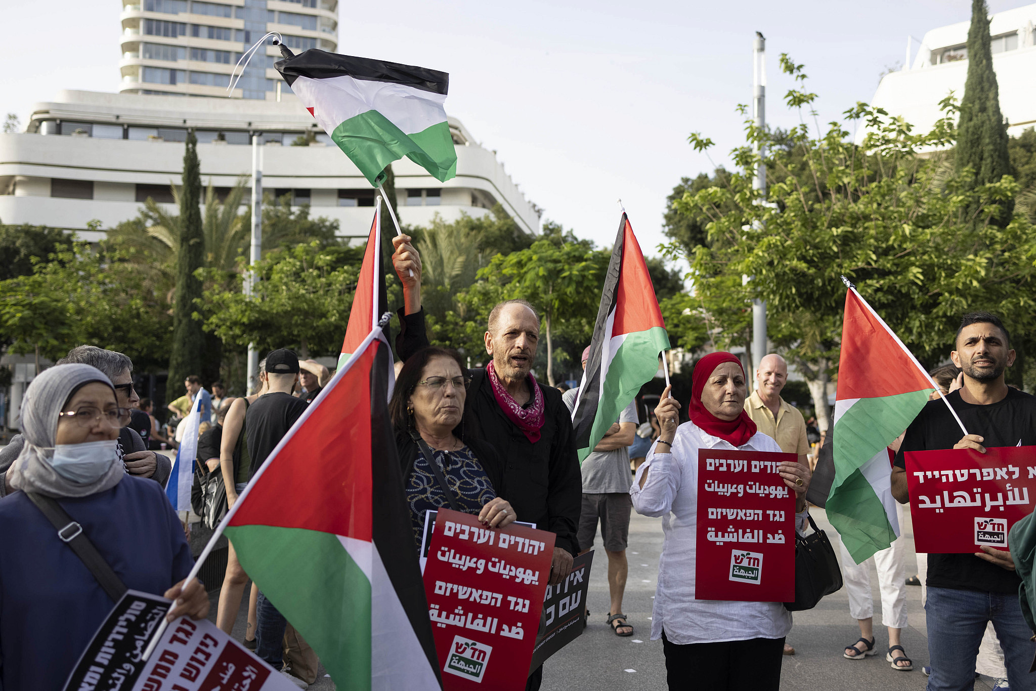 ​Demonstration by the anti-occupation​ bloc of Israel's anti-government protests, marking 56 years since the start of the military occupation, on Dizengoff Street in Tel Aviv, June 3, 2023. (Oren Ziv)
