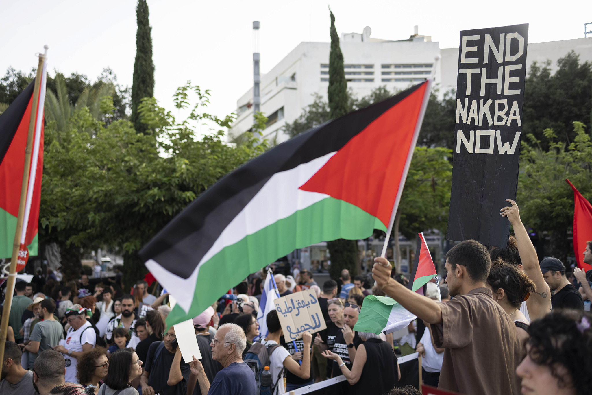 ​Demonstration by the anti-occupation​ bloc of Israel's anti-government protests, marking 56 years since the start of the military occupation, on Dizengoff Street in Tel Aviv, June 3, 2023. (Oren Ziv)