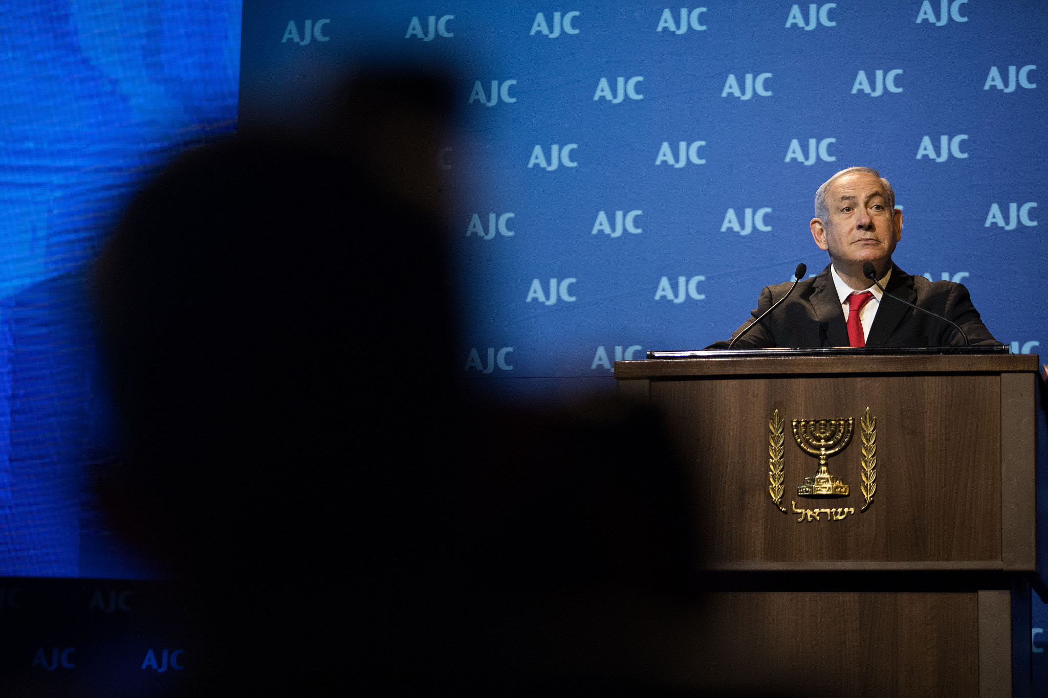 Prime Minister Benjamin Netanyahu speaks at the American Jewish Committee (AJC) Global Forum, in the Jerusalem Convention Center, June 10, 2018. (Noam Revkin Fenton/Flash90)