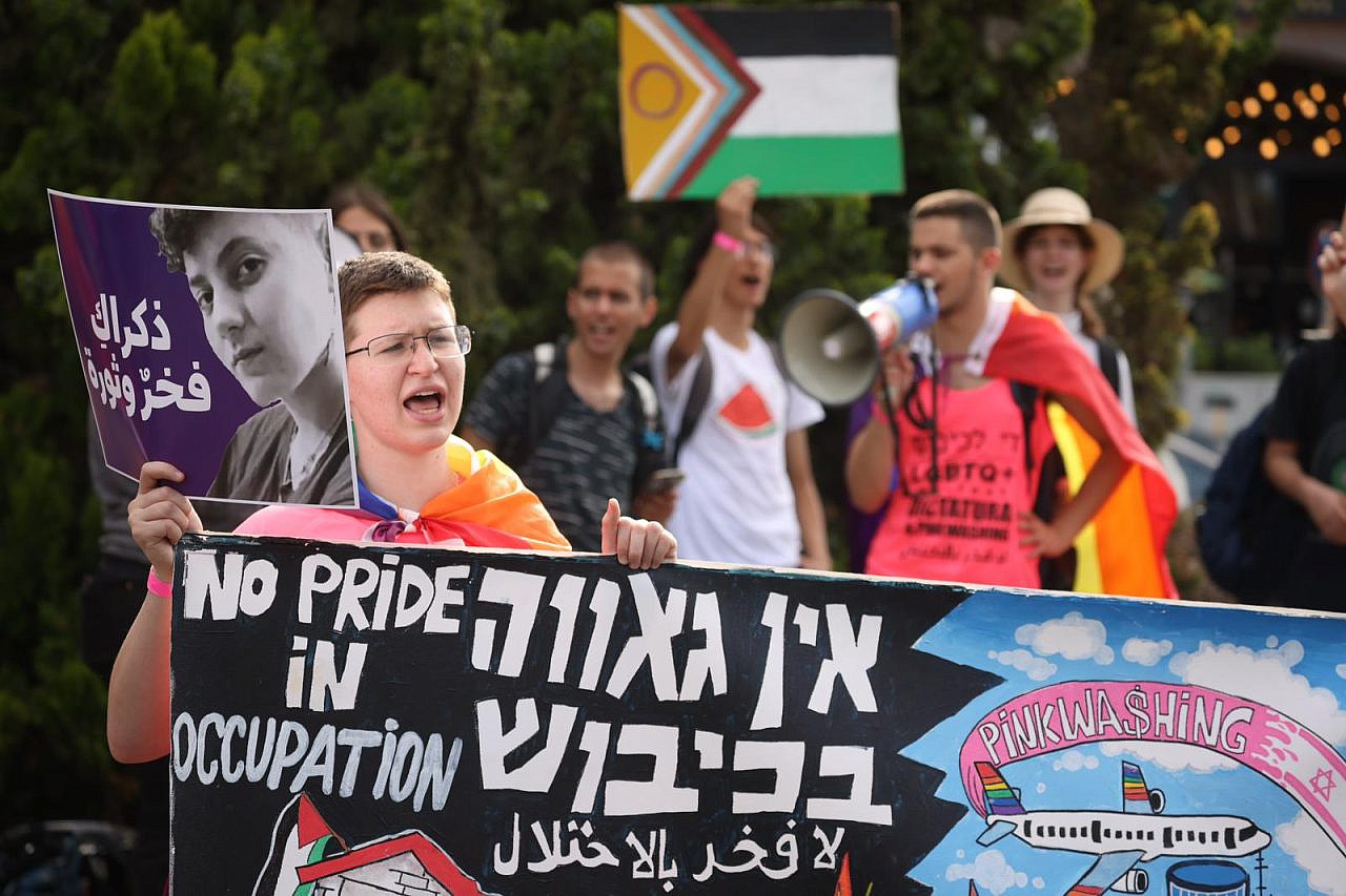 Activists take part in the anti-pinkwashing bloc during the Haifa Pride Parade, June 15, 2023. (Oren Ziv)