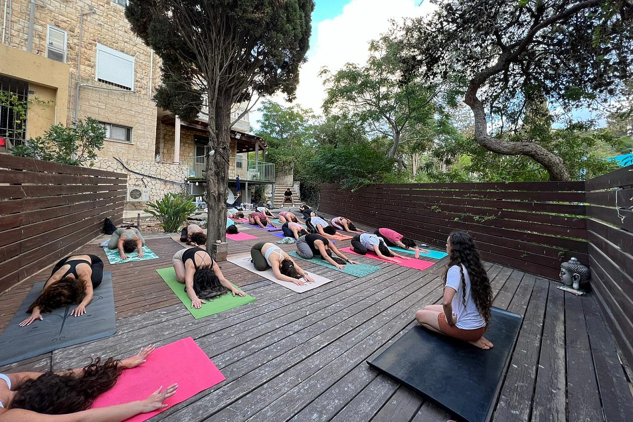 Maya Odeh teaching yoga in Haifa. 