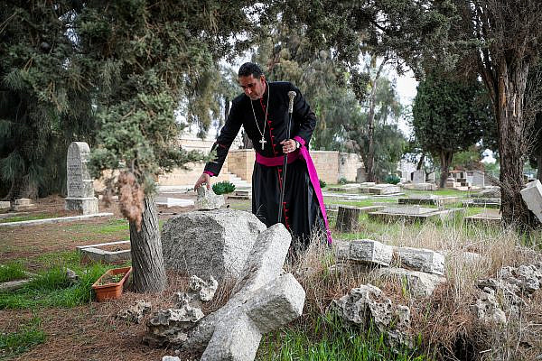 View of graves that were allegedly vandalized by Jewish men, in the Christian cemetery on Mount Zion, in the Old City of Jerusalem, January 4, 2023. (Jamal Awad/Flash90)
