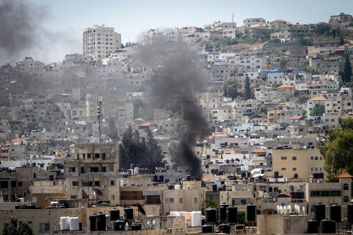 Smoke rises as Israel launches a major aerial and ground assault in the West Bank city of Jenin, July 3, 2023. (Nasser Ishtayeh/Flash90)