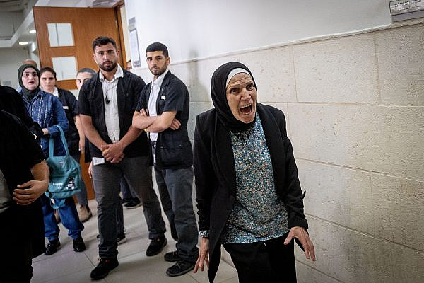 The mother of Iyad al-Hallaq reacts after the Jerusalem District Court acquits the police officer who who shot him dead, July 6, 2023. (Yonatan Sindel/Flash90)