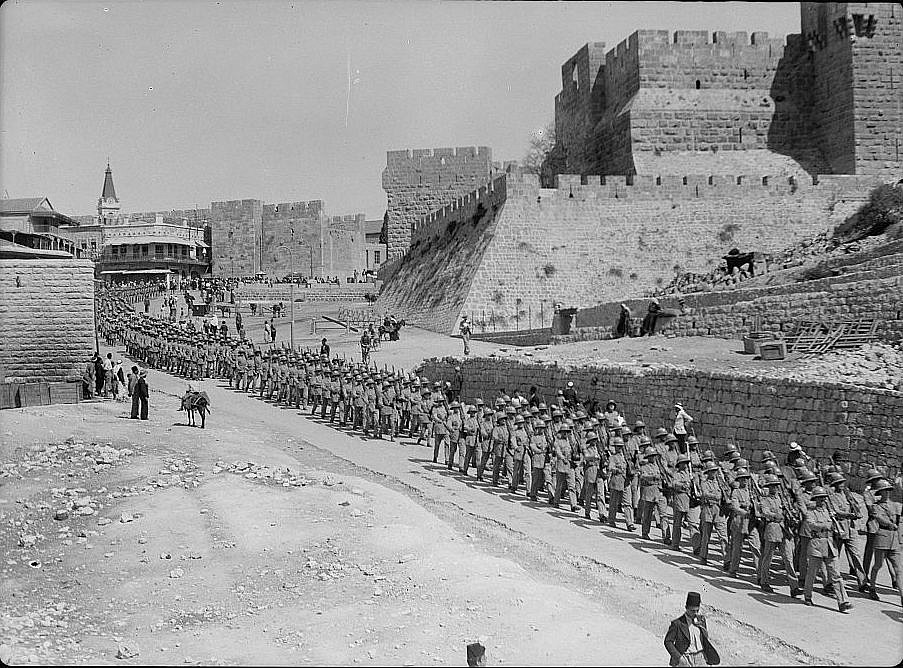 The Scots Guard regiment of the British army marches along Bethlehem Road outside the Old City of Jerusalem, 1936. (Library of Congress)