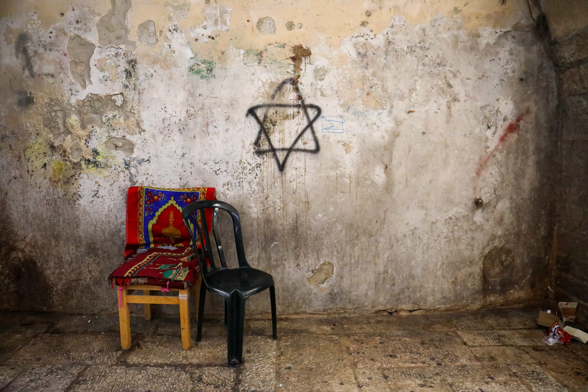 A Star of David graffiti drawn outside the home of the Ghaith Sub-Laban family in the Old City of Jerusalem, July 11, 2023. (Yahel Gazit)