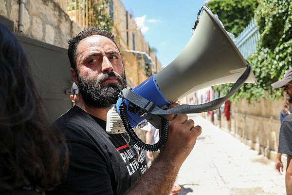 Rafat Sub-Laban protesting outside his family's home in the Old City of Jerusalem, after they were expelled to make way for Jewish settlers, July 11, 2023. (Yahel Gazit)