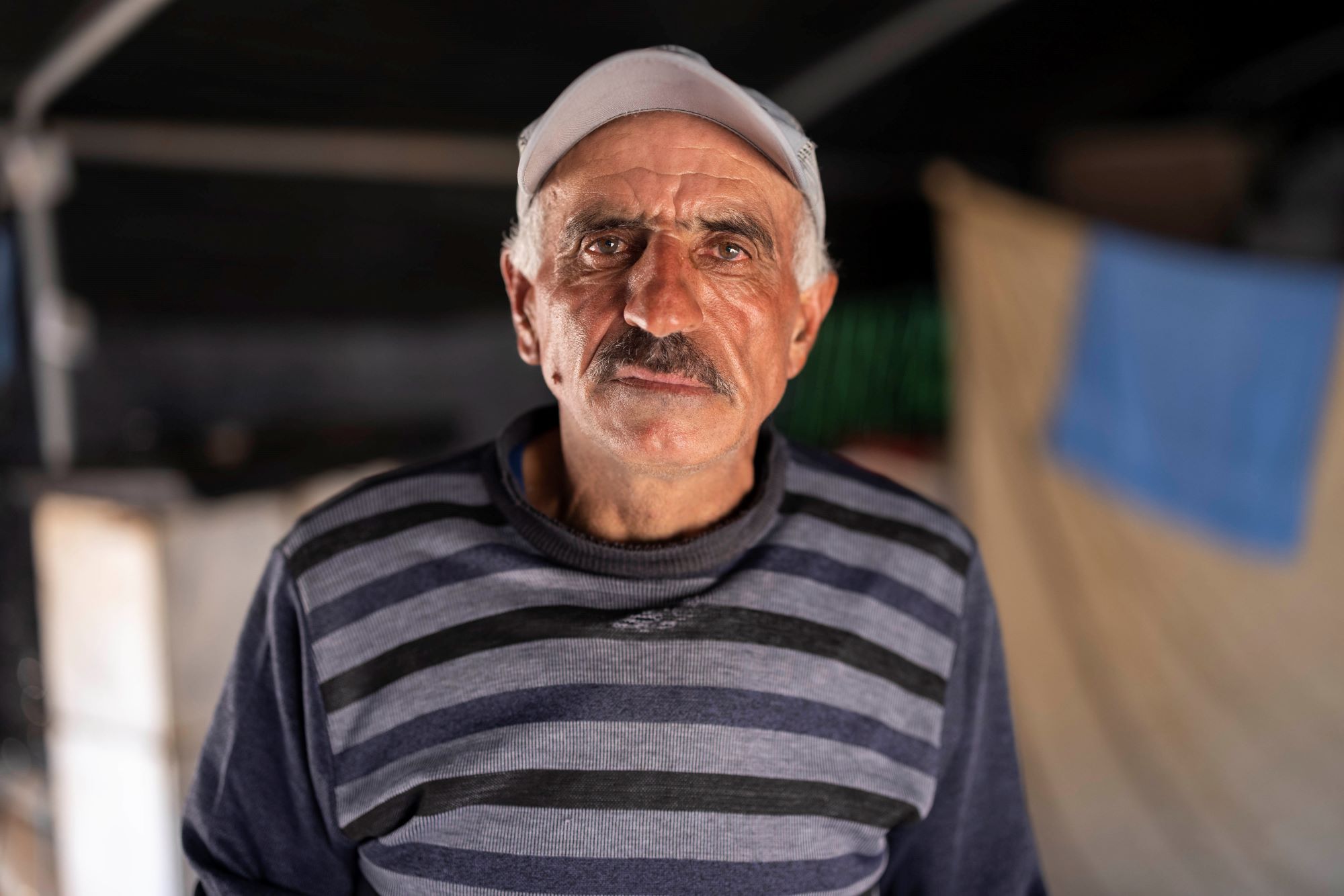 Ali Abu al-Kabash from the village of Al-Qabun, after the Palestinian community fled under the threat of Israeli settler violence, July 2023. (Oren Ziv)