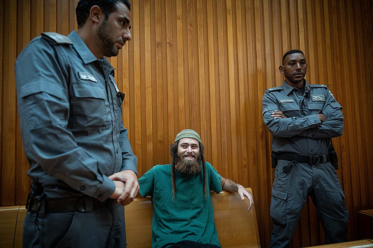 Elisha Yered, suspected of being involved in the death of 19-year-old Palestinian Qosai Jammal Mi'atan in the West Bank village of Burqa, arrives for a hearing at the Supreme Court in Jerusalem, August 9, 2023. (Yonatan Sindel/Flash90)