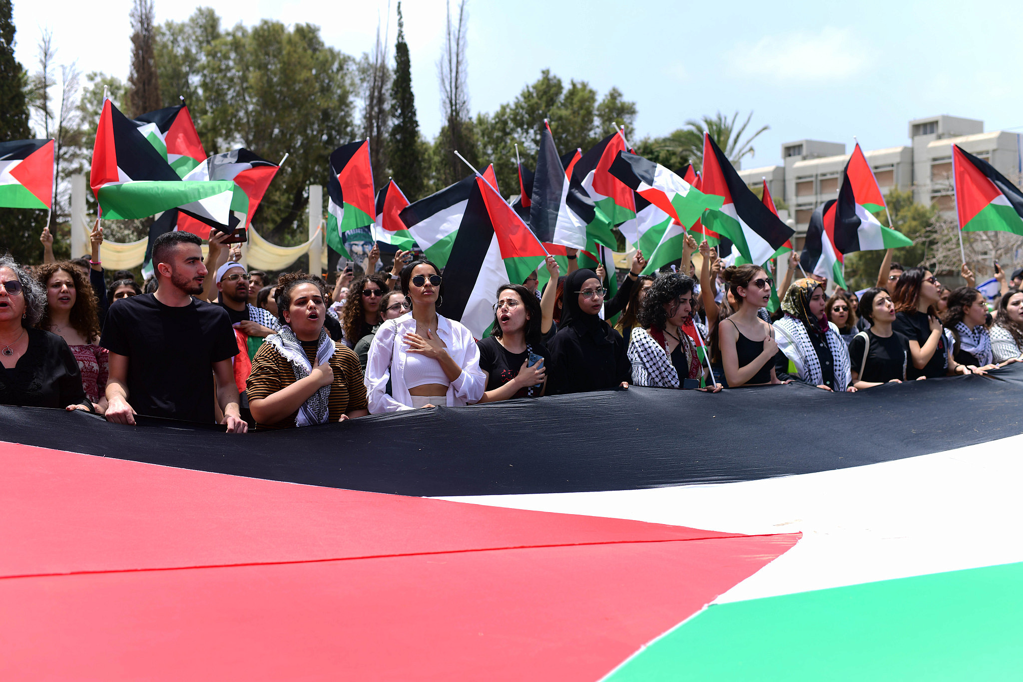 Palestinians and Israeli left-wing activist students, attend a rally marking the Nakba anniversary at Tel Aviv University, May 15, 2022. (Tomer Neuberg/Flash90)