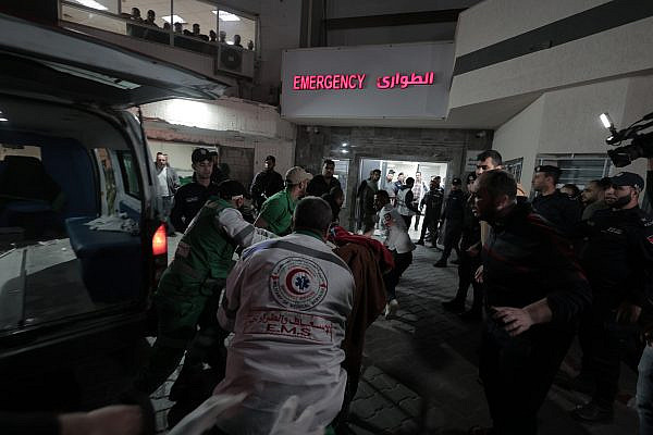 Wounded Palestinians from an Israeli airstrike arrive at Al-Shifa hospital, in Gaza City, May 9, 2023. (Atia Mohammed/Flash90)