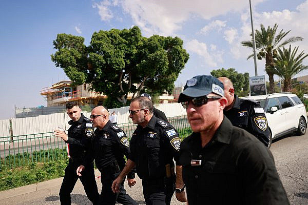 Israel's chief of police Kobi Shabtai is seen flanked by other police officers responding to an alleged terror attack in the Jewish settlement of Ma’aleh Adumim, outside of Jerusalem, August 1, 2023. (Chaim Goldberg/Flash90)