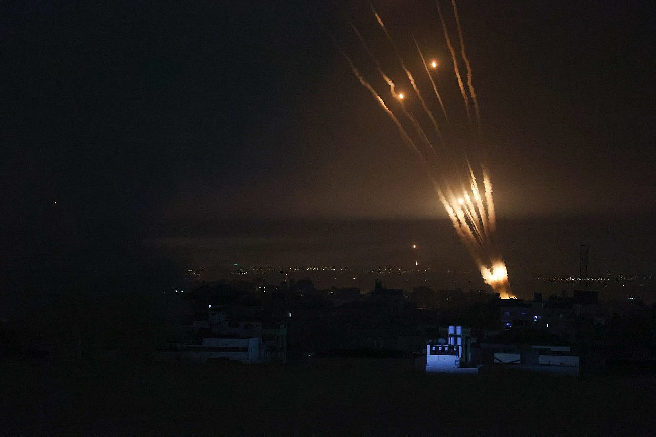 Rockets are fired from Gaza into Israel, southern Gaza Strip, October 7, 2023. (Atia Mohammed/FLASH90)