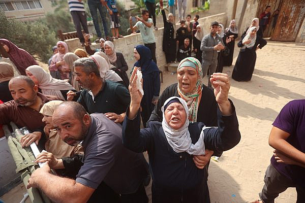 Families react to Palestinian family members having been killed in Israeli airstrikes during recent fighting between Israel-Gaza. October 9, 2023. (Atia Mohammed/Flash90)