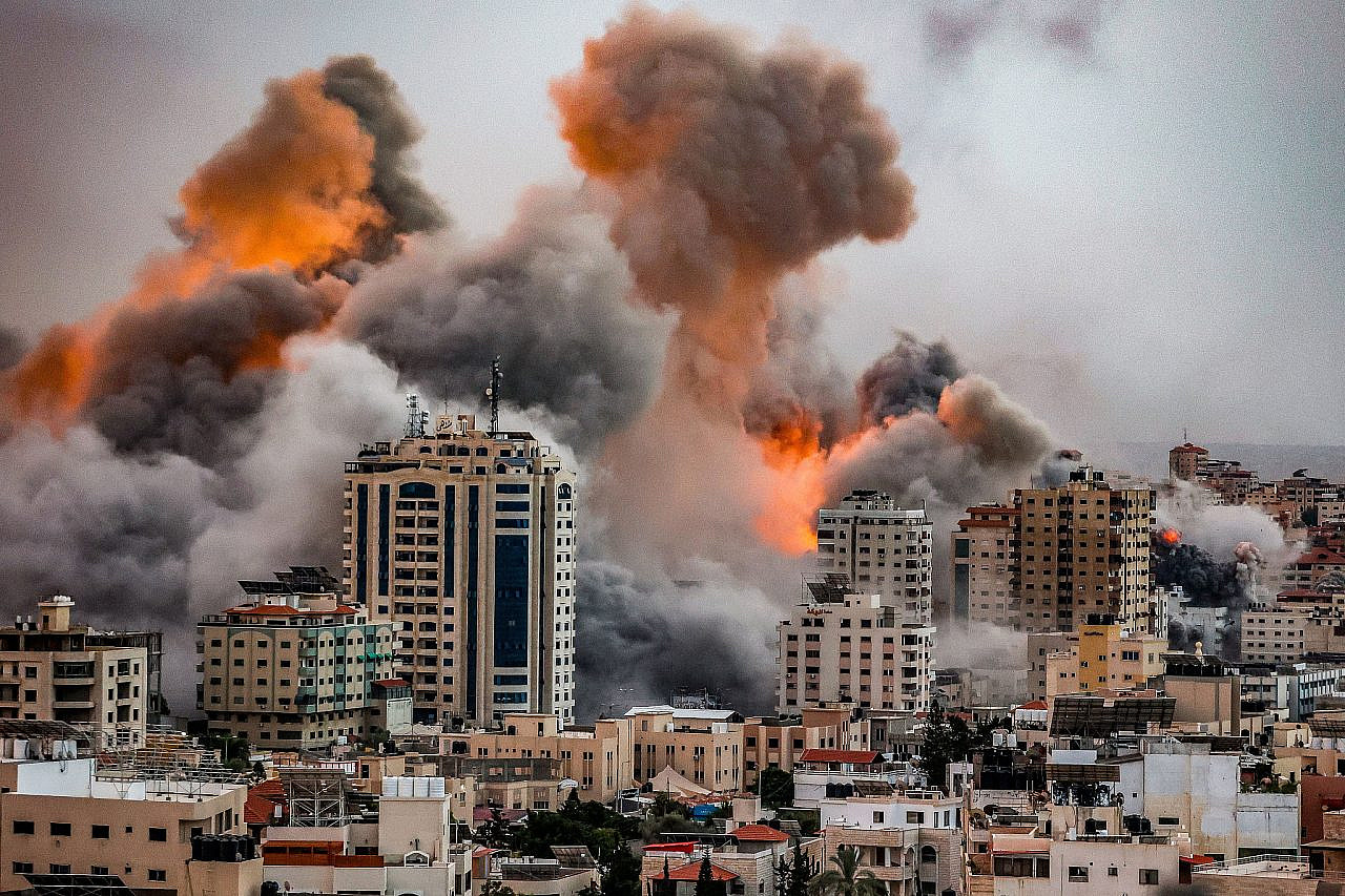 A ball of fire and smoke rises during Israeli airstrikes in the Gaza Strip, October 9, 2023. (Atia Mohammed/Flash90)