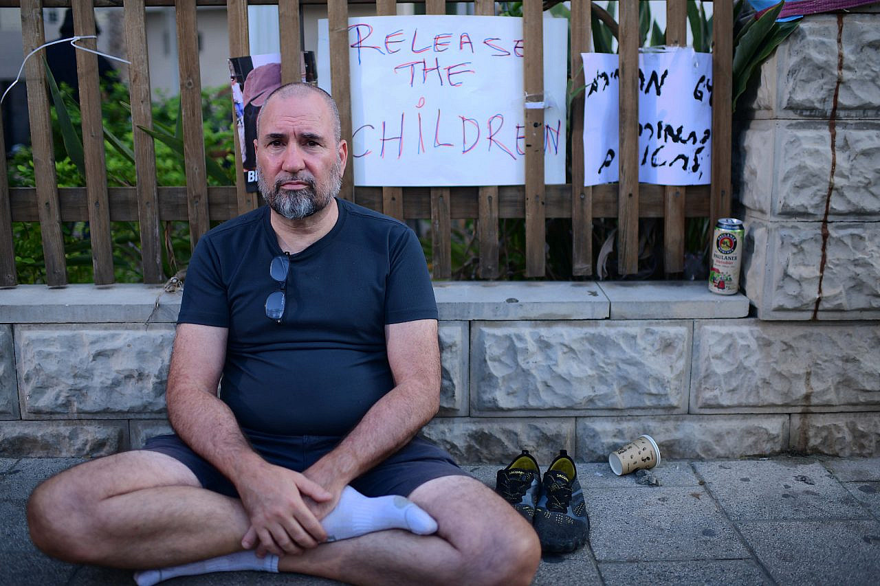 Families of Israelis held hostage by Hamas militants in Gaza protest outside the military headquarters in Tel Aviv, October 14, 2023. (Tomer Neuberg/FLASH90)