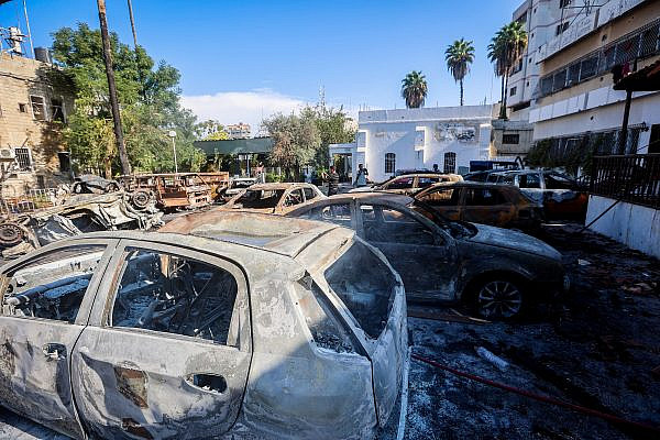 Burned cars are seen in the aftermath of the explosion at Al-Ahli Arab Hospital, Gaza City, October 18, 2023. (Atia Mohammed/Flash90)