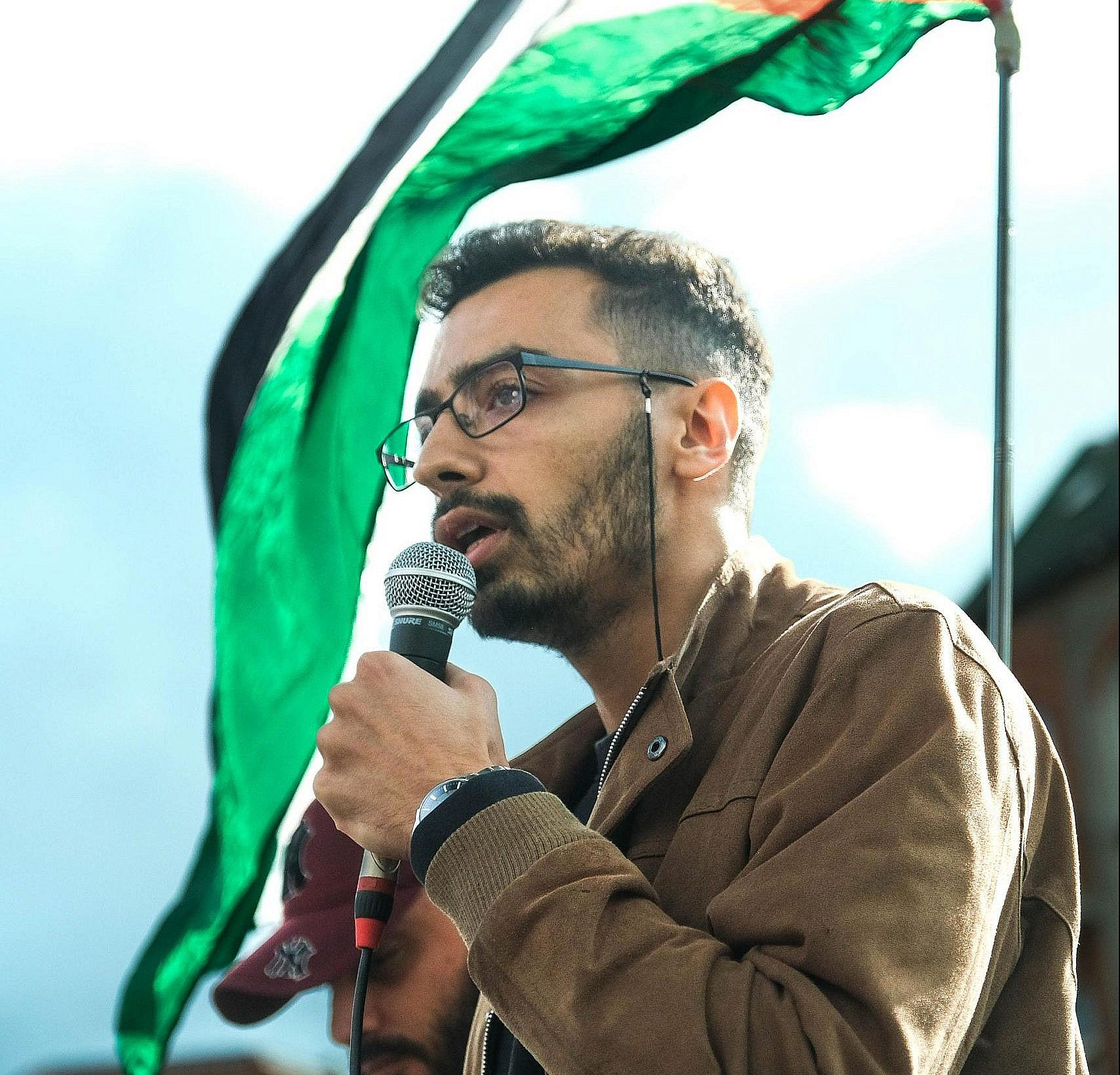 Zaid Abdulnasser speaking at an event. Photo: Samidoun.