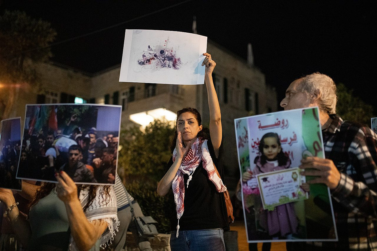 Palestinian citizens of Israel and left-wing Israeli activists at a protest against Israeli attacks on the Gaza Strip, in Haifa, May 11, 2023. (Shir Torem/Flash90)
