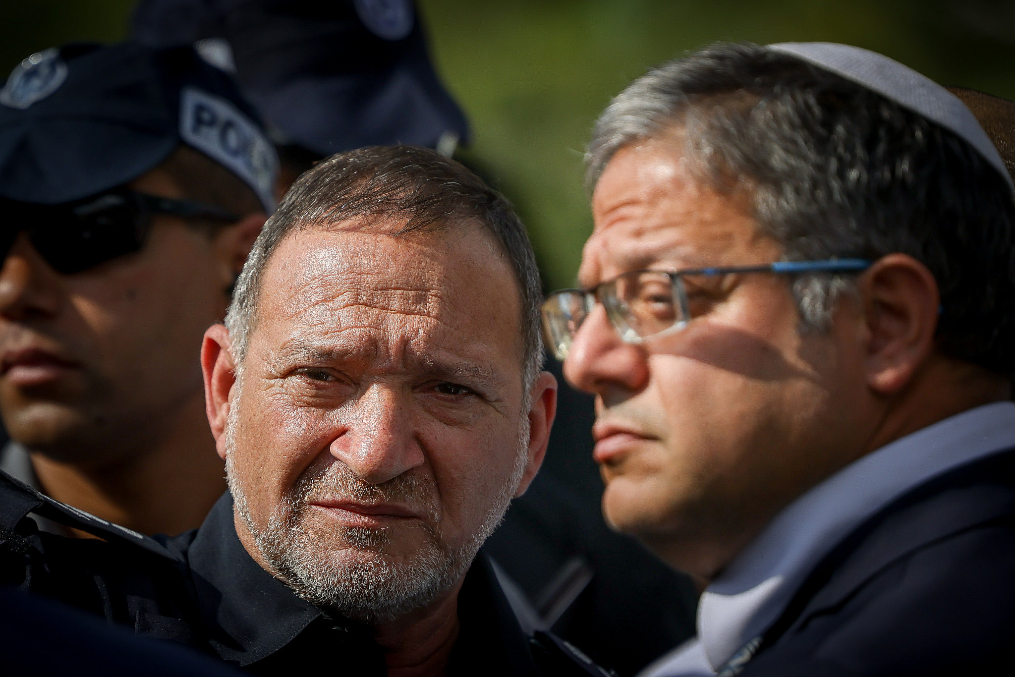 Police chief Kobi Shabtai with Israeli Minister of National Security Itamar Ben Gvir at the scene of an attack in the Jewish settlement of Ma’aleh Adumim, outside of Jerusalem, August 1, 2023. (Chaim Goldberg/Flash90)