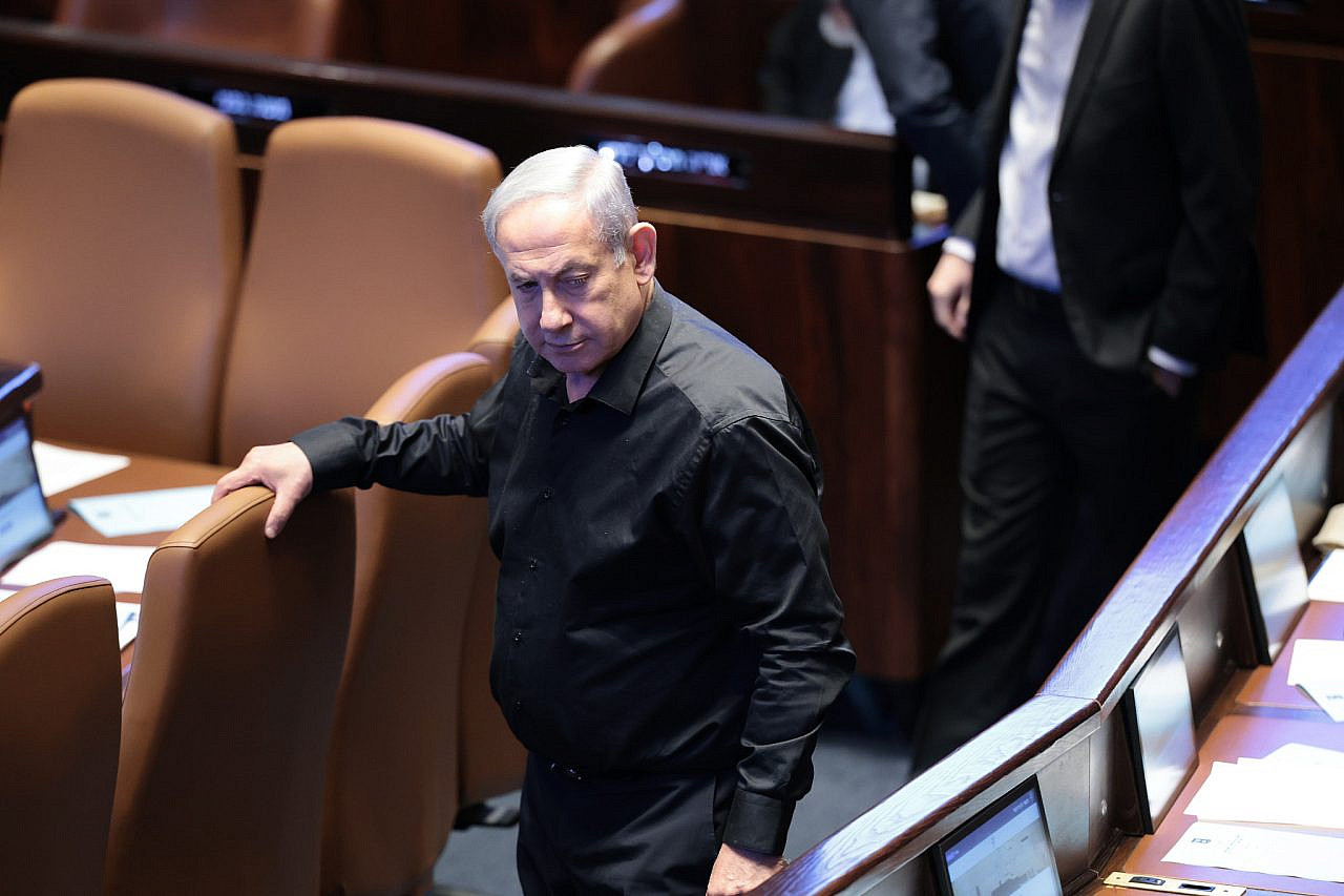 Israeli Prime Minister Benjamin Netanyahu attends a plenum session in the Israeli Knesset, October 16, 2023. (Noam Revkin Fenton/Flash90)