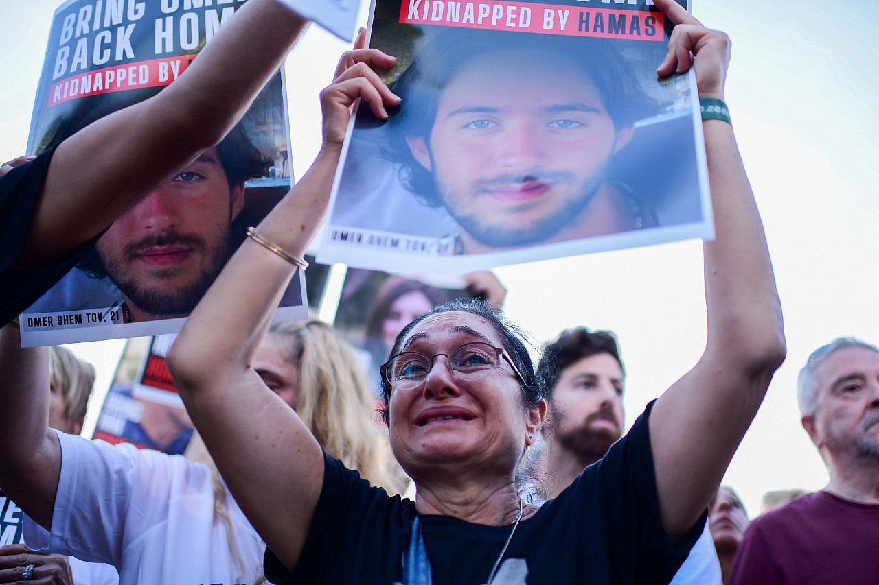 Families and supporters of Israelis held hostage in Gaza and protest for their release at "Hostage Square" outside the Tel Aviv Museum of Art, October 26, 2023. (Tomer Neuberg/Flash90)